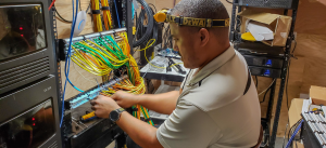 Technician installing structured cabling